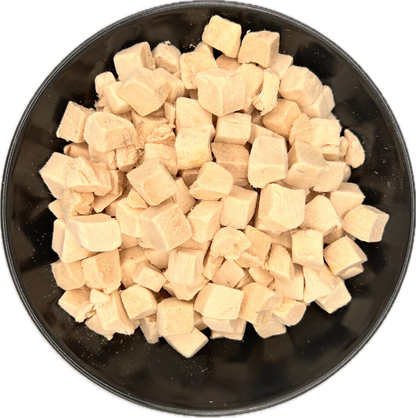 BritTail Freeze-Dried Chicken Bits in black bowl